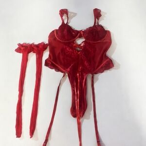red lingerie ensemble appears to be a multi-piece set For Woman Size Large